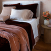 carmen shams in autumn with matching quilted coverlet in silk velvet with other pink and white tones.