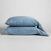 Bria Standard Pillowcase (Single) | Tahoe Blue | Two cotton sateen sleeping pillows, stacked neatly against a white backdrop - side view.