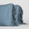 Linen Pillowcase (Single) | Tahoe Blue | a pair of lace-trimmed pillowcases upright against a white background.