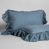 Linen Whisper Sham | Tahoe Blue | standard sham leaning against a king sham laying flat, on a plain background.