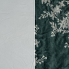 Lynette Luxe Duvet Cover | Eucalyptus | an image of tencel and embroidered silk velvet side-by-side in eucalyptus, a mid-tone green.