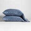 Paloma Pillowcase (Single) | Tahoe Blue | two sleeping pillows neatly stacked on white background.