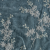 Lynette Yardage | Cloud | A close up of embroidered silk velvet fabric in cloud, a soft, subtle sky blue-grey.