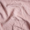 Midweight Linen Yardage | Rouge | A close up of midweight linen fabric in rouge, a mid-tone blush pink.